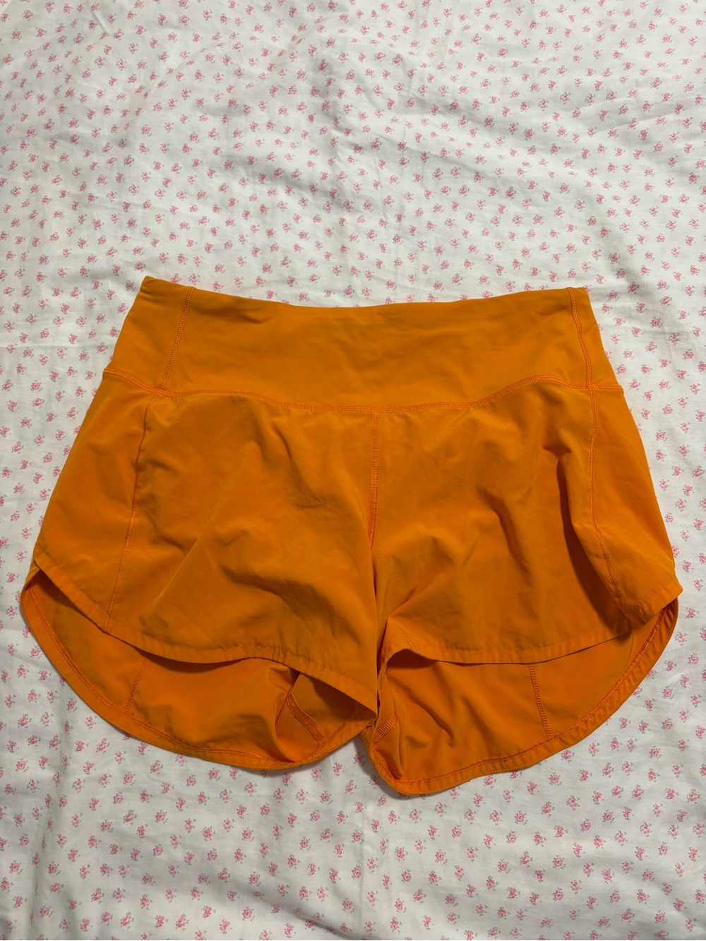 Lululemon orange shorts 
Size L
